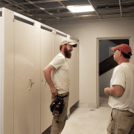 Photo of the friendly restroom partition experts at Partition Plus, available to help customers buy the stalls they need for their bathroom