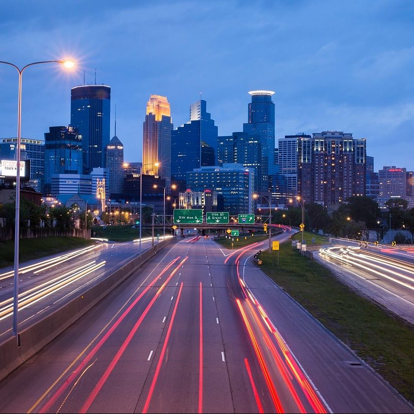 Minneapolis, Minnesota is noted for changing weather conditions. Buy your Minneapolis bathroom partitions from Partition Plus to be prepared for changing restroom conditions. Photograph of Minneapolis, Minnesota skyline at night with light trails.