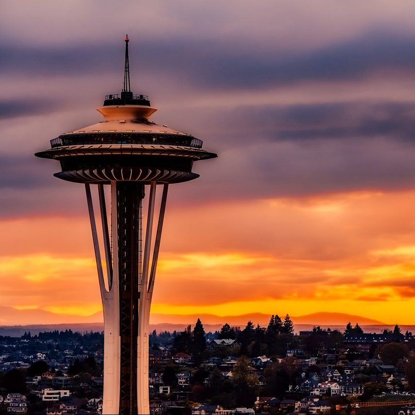 The Space Needle is widely recognized Seattle landmark. Partition Plus is regarded as a top supplier of toilet partitions in the Seattle, Washington area. Photograph of Space Needle in Seattle, Washington, against orange sunset.
