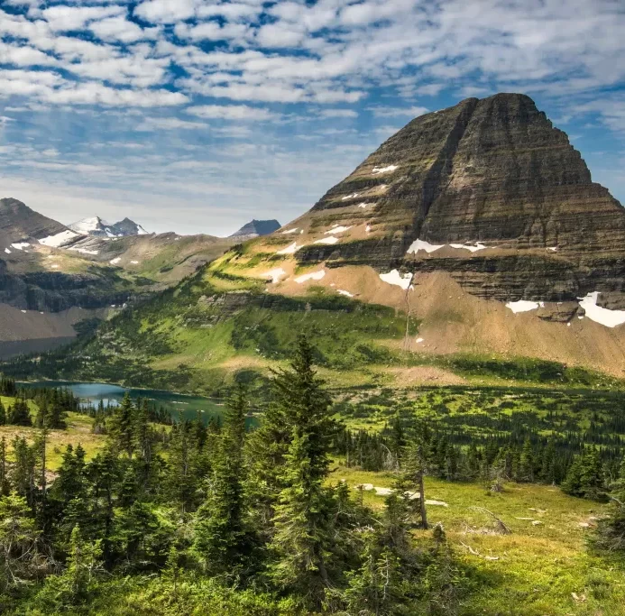 Sometimes, having a great view is very important. Other times, privacy is important. For high privacy toilet partitions in Billings, Montana and surrounding areas, turn to Partition Plus. Photograph of Montana valley mountains. Clouds, rocky peaks, blue sky.