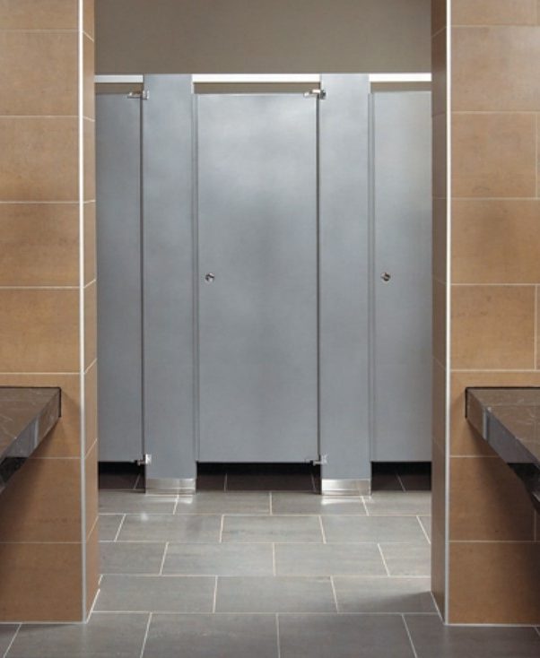 Powder coated steel toilet partitions in a commercial restroom