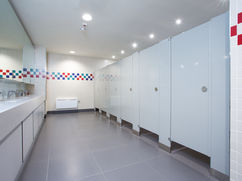 Installed white commercial restroom partitions