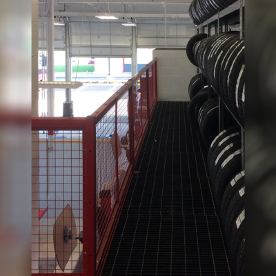 Photograph of BeastWire RailGuard in place on a garage mezzanine.