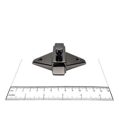 Photograph of surface latch from Bobrick In-Swing Door Hardware Kit - 1002038, with ruler.