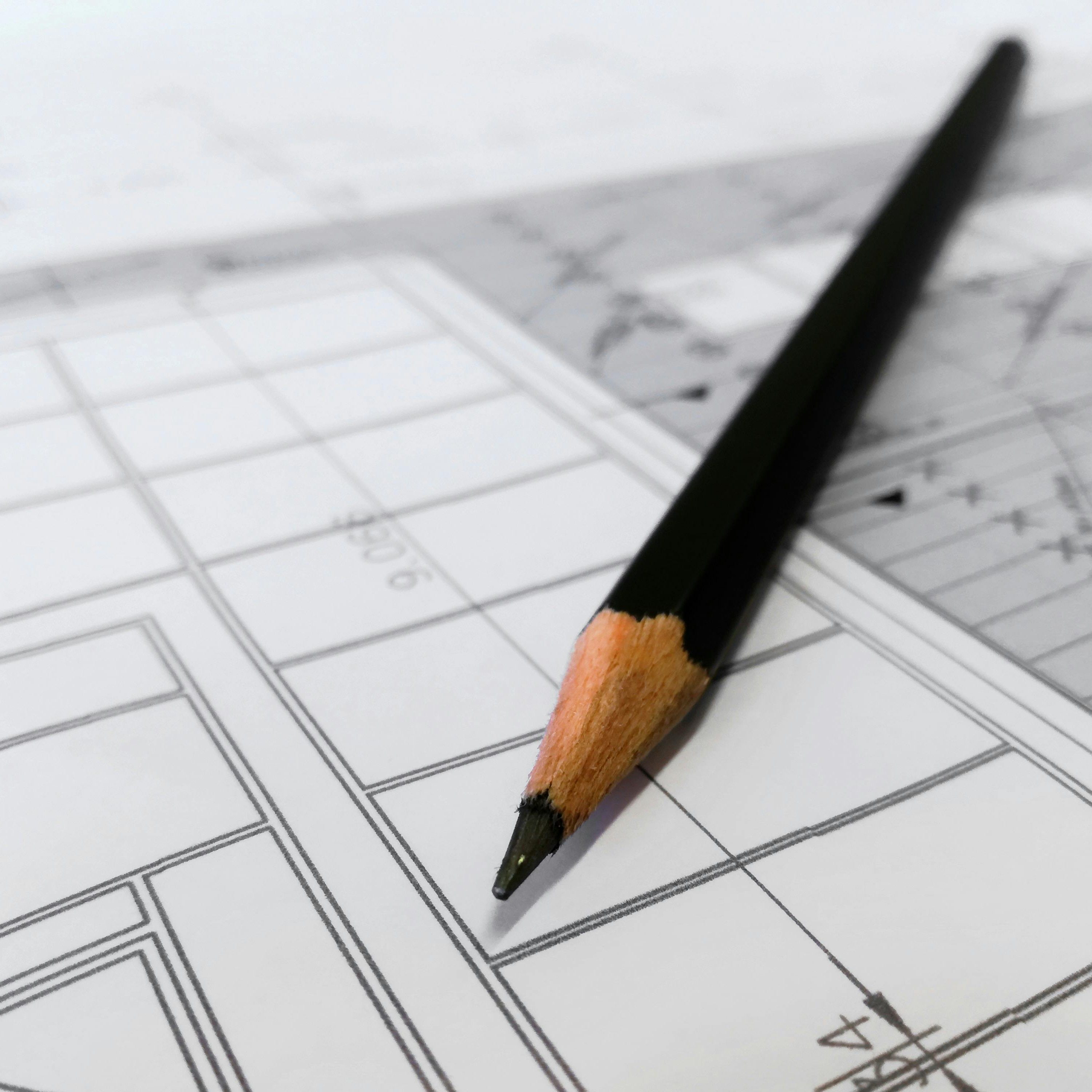 Photo of architectural drawings to be submitted to receive a free bathroom partition quote from Partition Plus