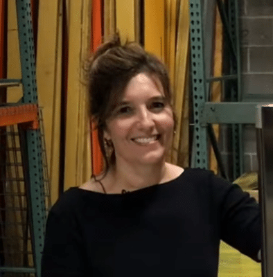 Photo of a mini shopping cart on a laptop to represent an online shopping button for toilet partitions from Partition Plus